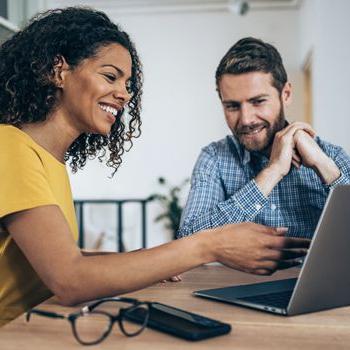 People in a meeting on laptop